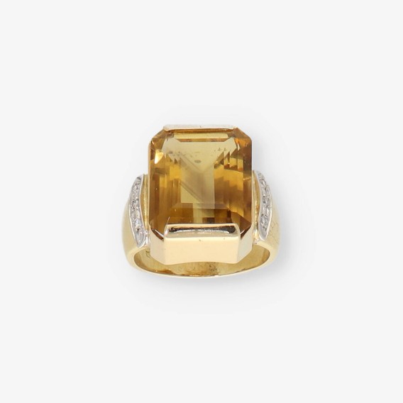 Anillo de oro 18kt con topacio y brillantes