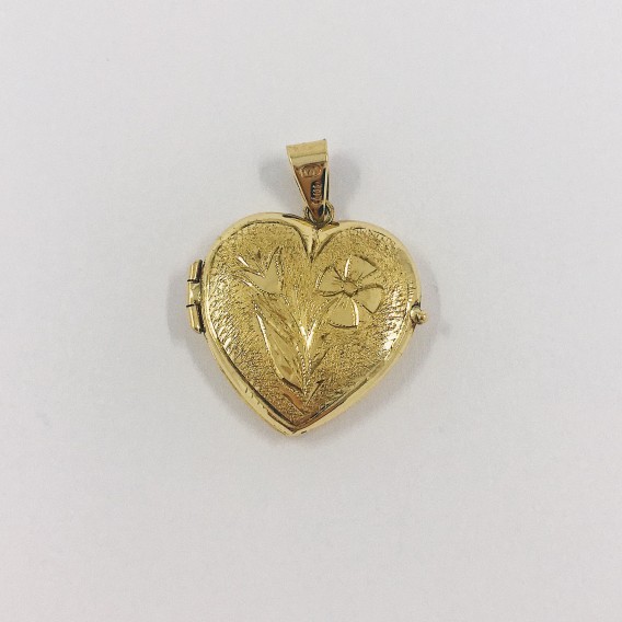 Colgante de oro 18kt en forma de corazÃ³n.