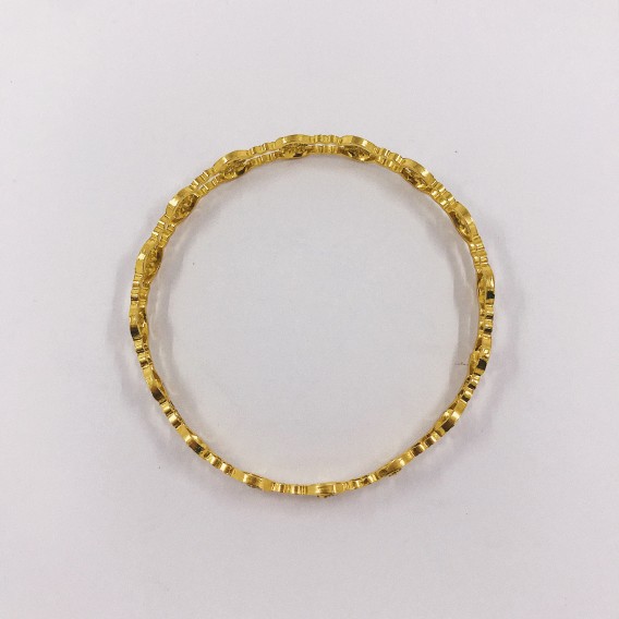 Esclava en oro 18kt con flores.