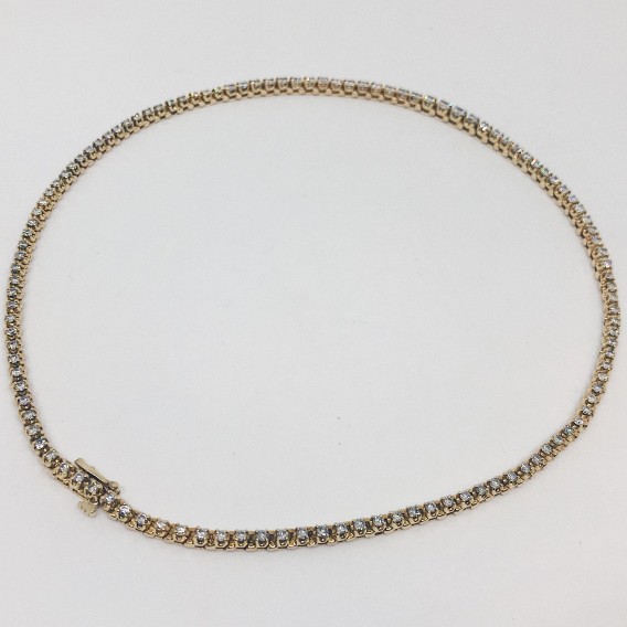 Gargantilla riviere en oro 18kt con brillantes.