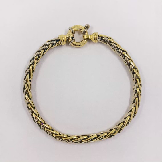 Pulsera trenzada en oro bicolor de 18kt