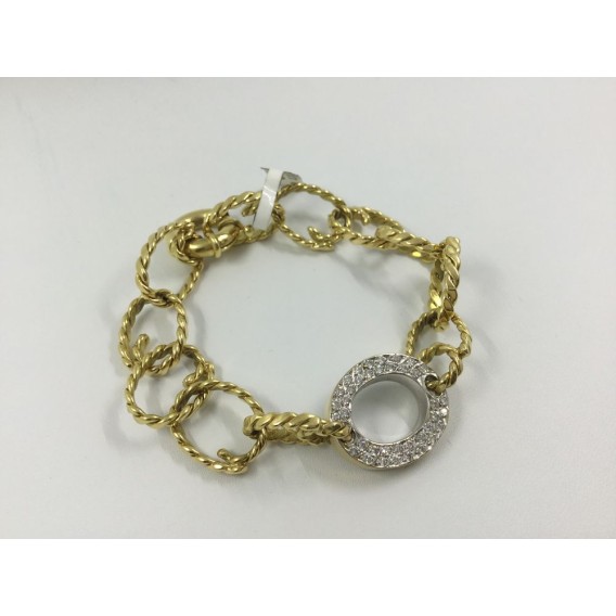 Pulsera en oro amarillo con centro de brillantes