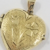 Colgante de oro 18kt en forma de corazón.
